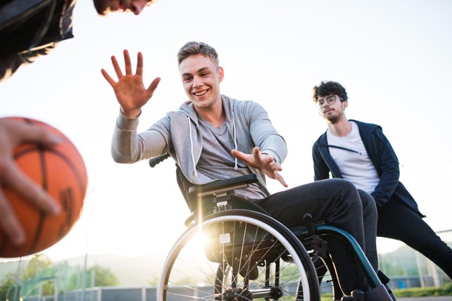 Disabled Boy Playing Basketball