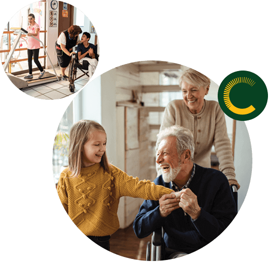 Claro-New-South-Wales1 A support worker asssisting two people with disabilities and a little girl holding the hand of an older man in a wheelchair with an older woman pushing from behind, all are smiling