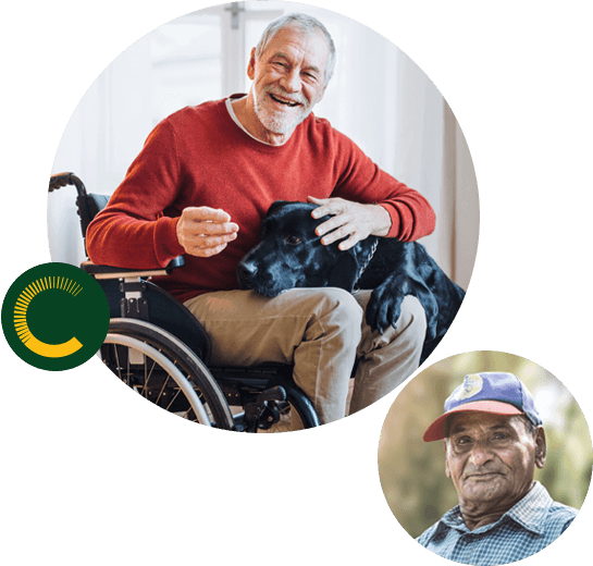 everyday-supports-1 An older man in a wheelchair with his dog's head on his lap, smiling at the camera and an older man looking into the camera