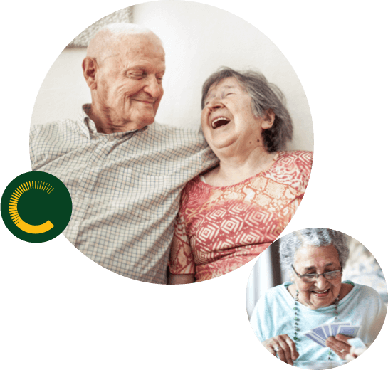 Older woman smiling whilst holding cards and an older couple smiling and laughing with the man's arm around the woman